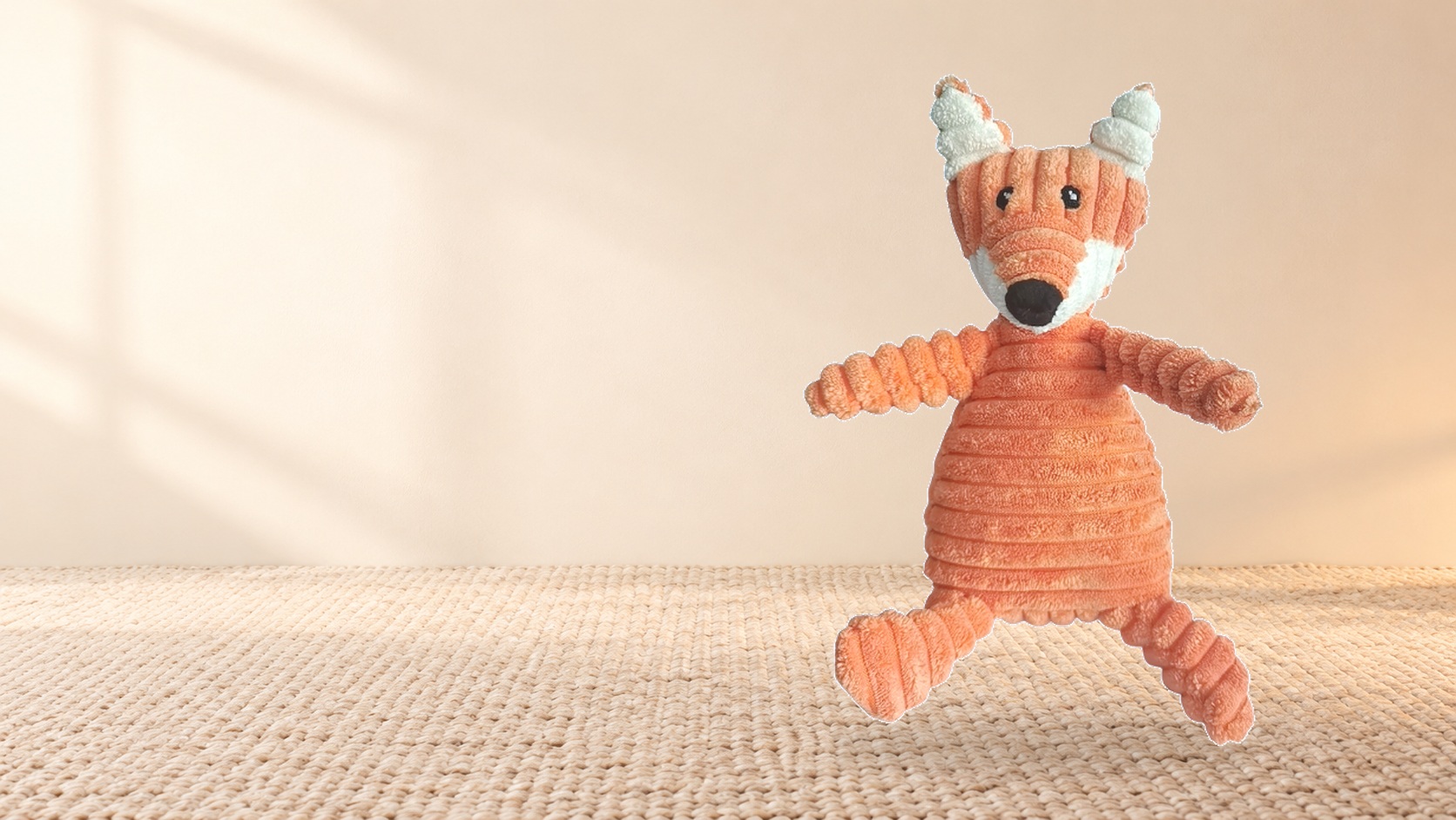 Complete orange corduroy fox toy with white face, ears and four limbsslider_item_1